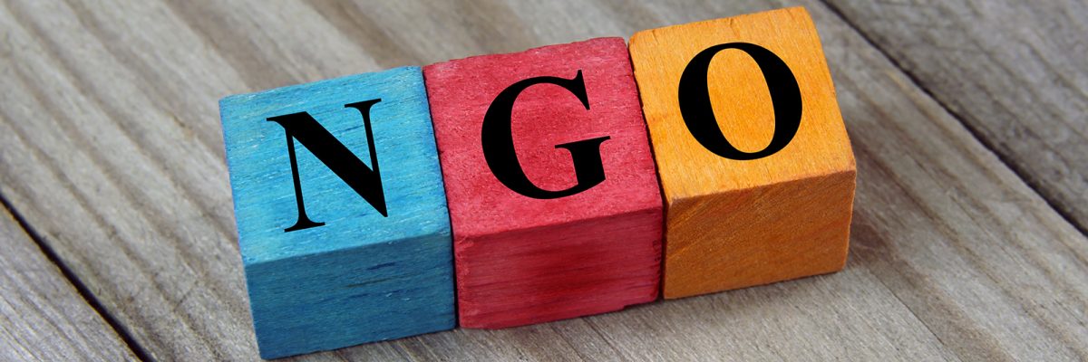 NGO (Non-Governmental Organization) sign on colorful wooden cube