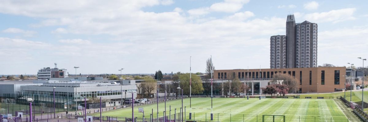 Loughborough University 1st XV Rugby Pitch and East Park with Towers in the background, featuring in the initial GaWC logo