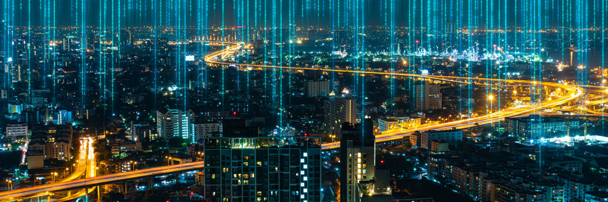 Modern cityscape with wireless network connection technology concept at night